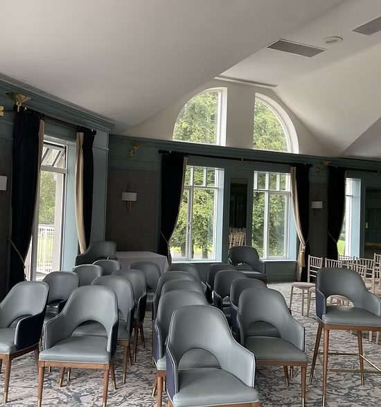 Function room chairs reupholstered in grey fabric at a Dublin venue