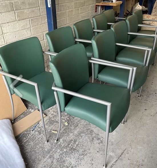 Green leather office chairs reupholstered in the James Young workshop